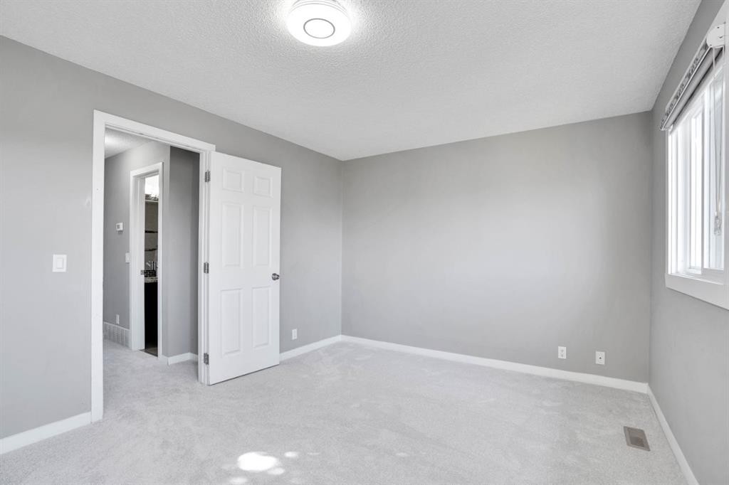 120 Tararidge Close Ne, Calgary, AB - Indoor Photo Showing Other Room