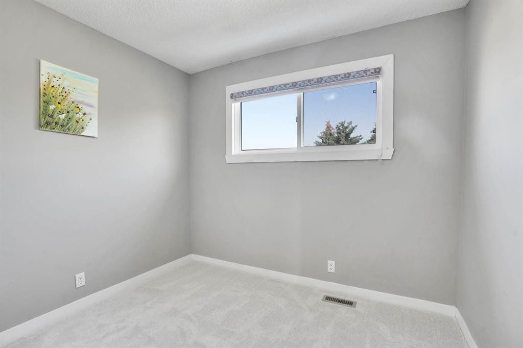 120 Tararidge Close Ne, Calgary, AB - Indoor Photo Showing Other Room