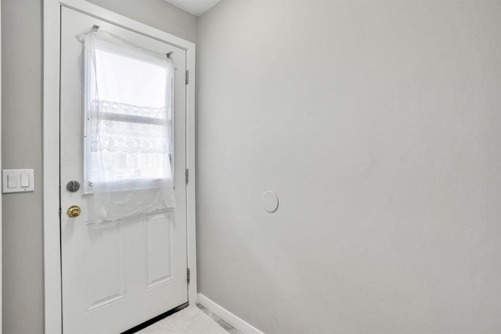 120 Tararidge Close Ne, Calgary, AB - Indoor Photo Showing Other Room