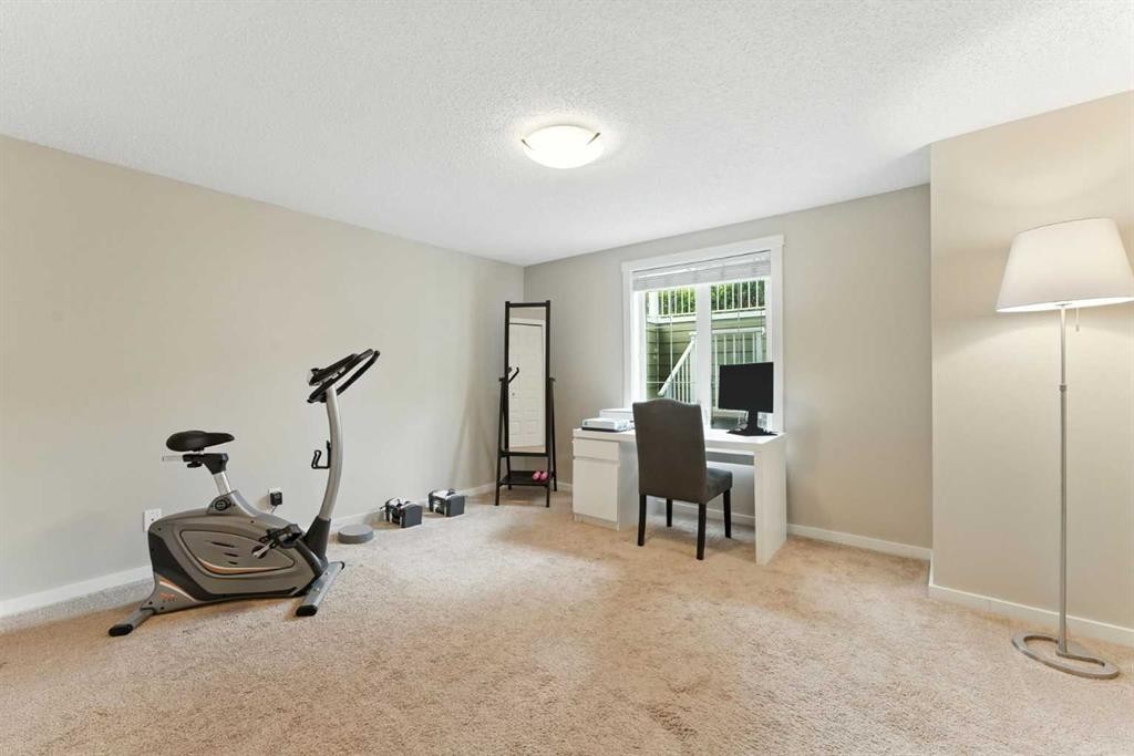 927 Auburn Bay Circle Se, Calgary, AB - Indoor Photo Showing Gym Room