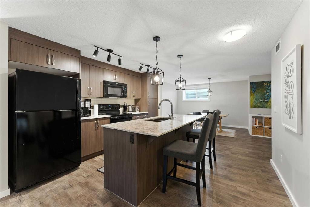 927 Auburn Bay Circle Se, Calgary, AB - Indoor Photo Showing Kitchen With Upgraded Kitchen