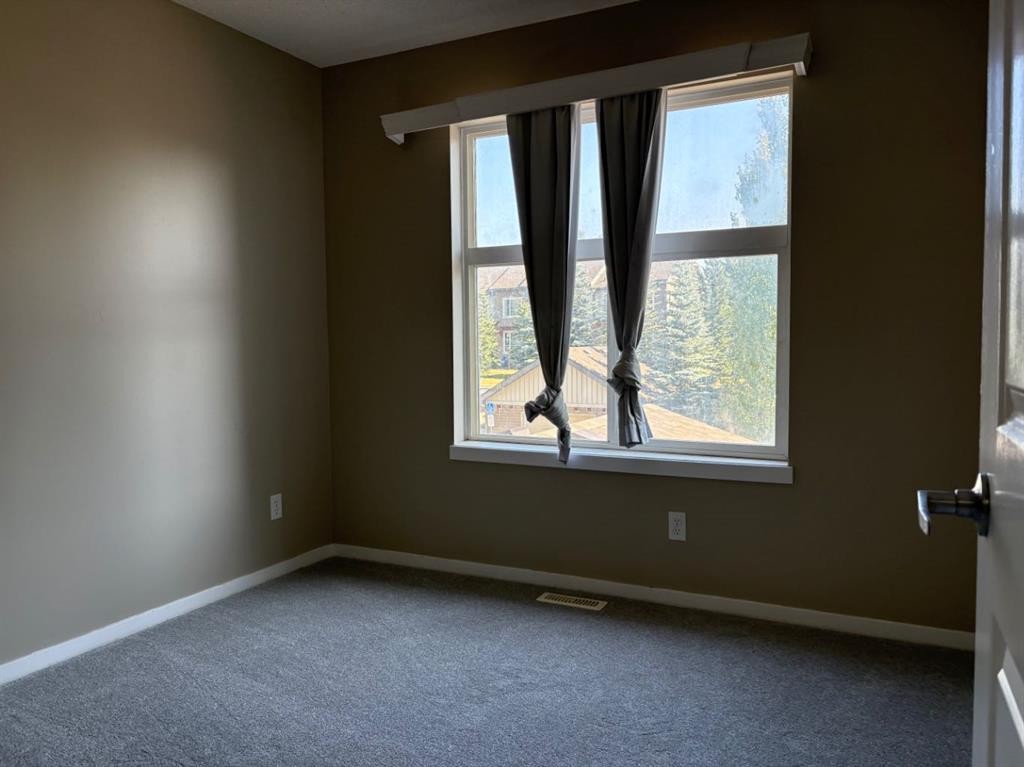 135 Chapalina Square Se, Calgary, AB - Indoor Photo Showing Other Room