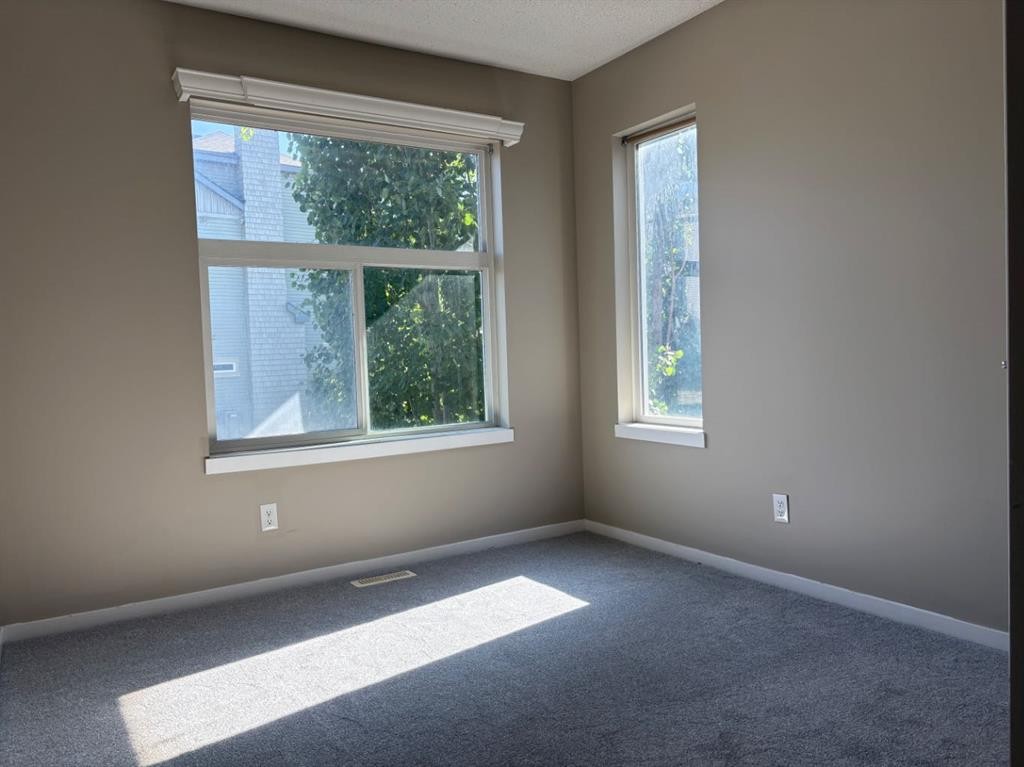 135 Chapalina Square Se, Calgary, AB - Indoor Photo Showing Other Room