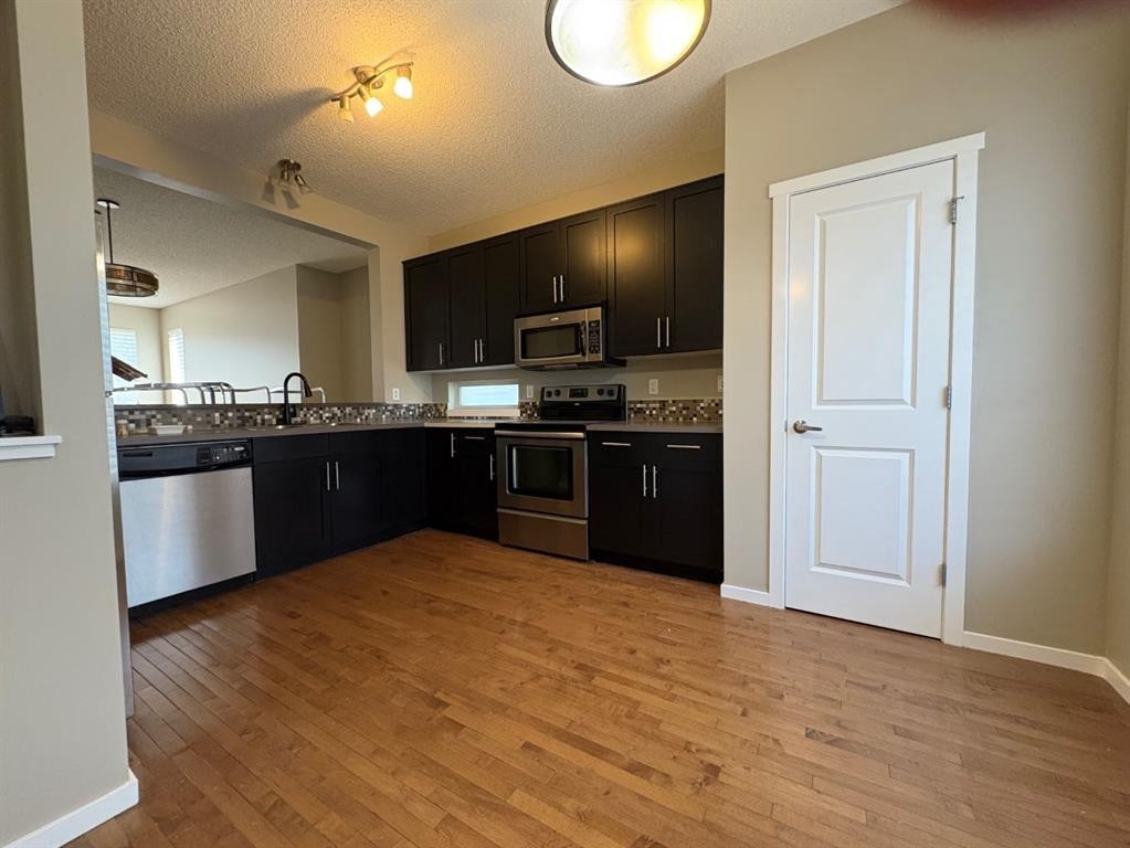 135 Chapalina Square Se, Calgary, AB - Indoor Photo Showing Kitchen