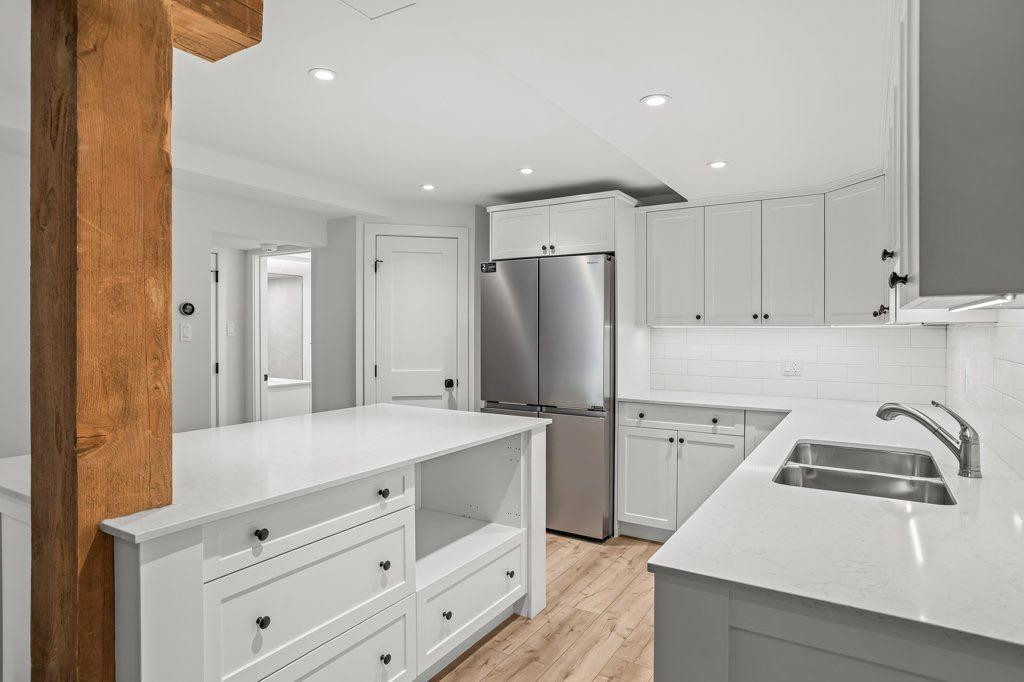 115 Spray Avenue, Banff, AB - Indoor Photo Showing Kitchen With Double Sink