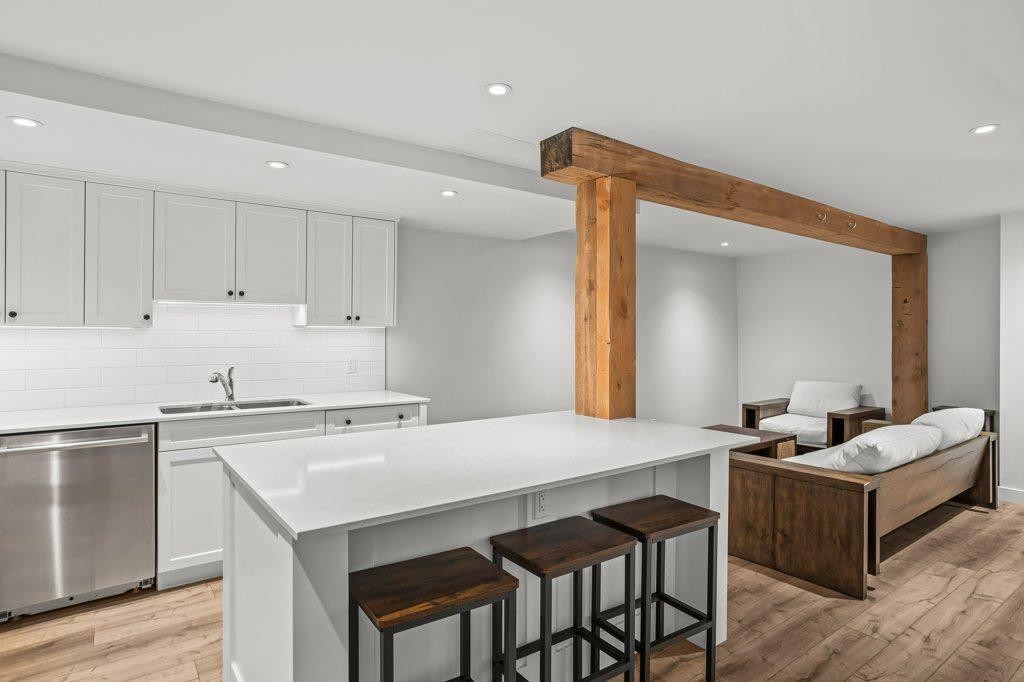 115 Spray Avenue, Banff, AB - Indoor Photo Showing Kitchen With Double Sink With Upgraded Kitchen