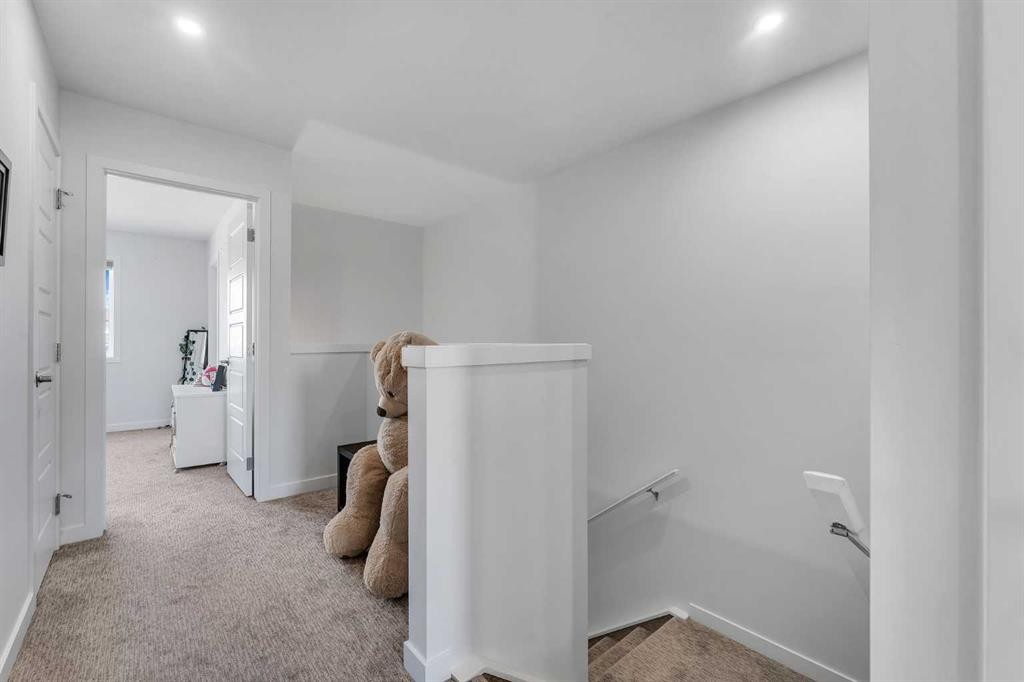 72 Creekside Boulevard Sw, Calgary, AB - Indoor Photo Showing Other Room