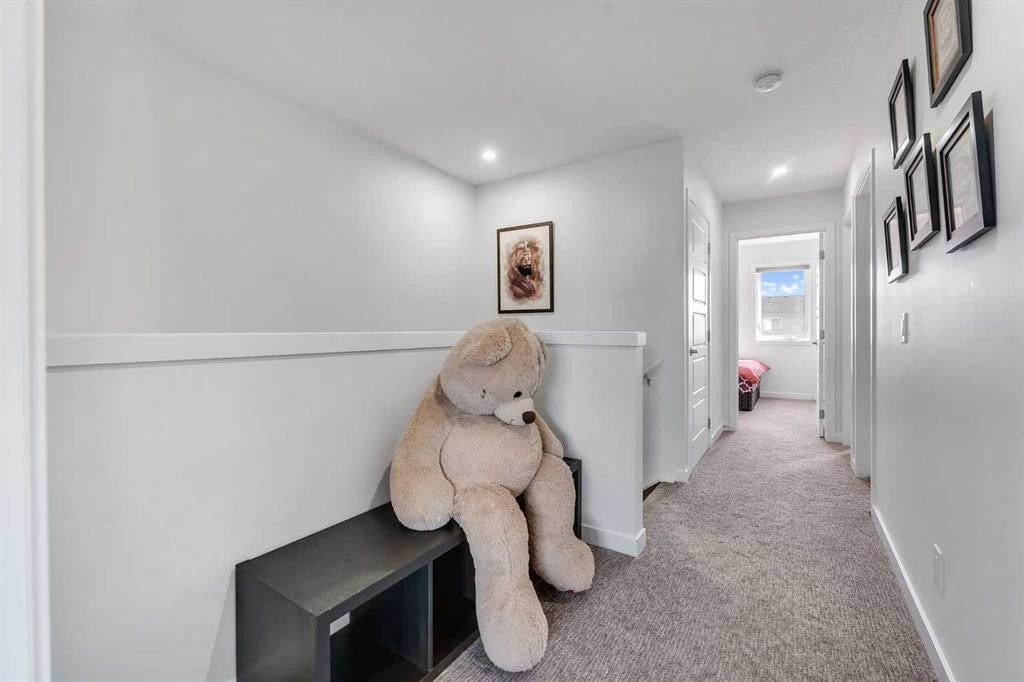72 Creekside Boulevard Sw, Calgary, AB - Indoor Photo Showing Other Room