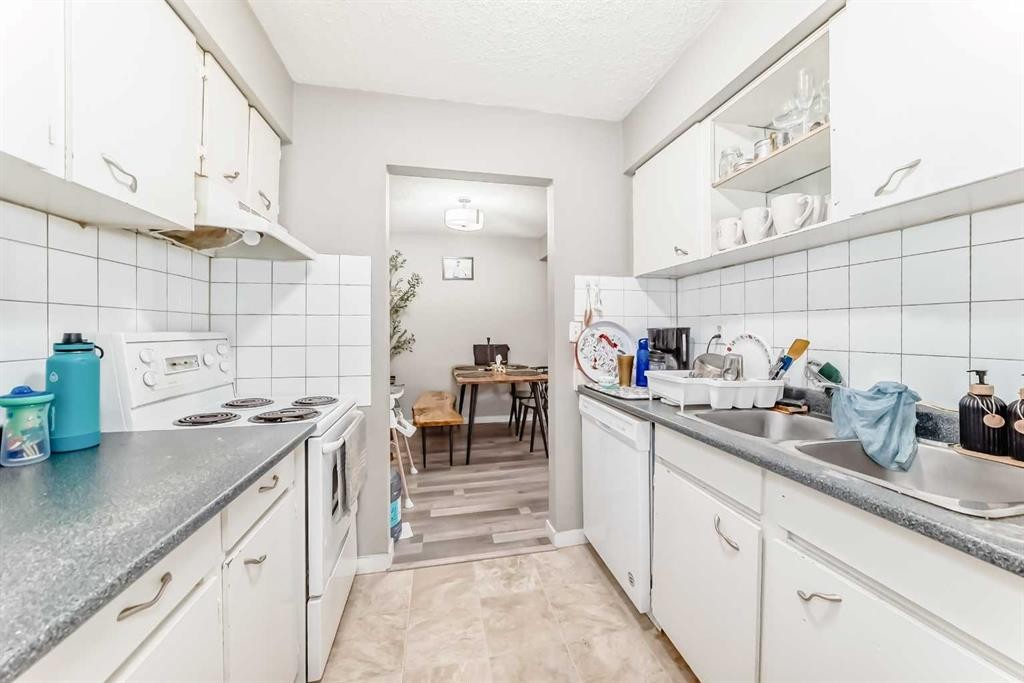 4611 50 Street, Red Deer, AB - Indoor Photo Showing Kitchen With Double Sink