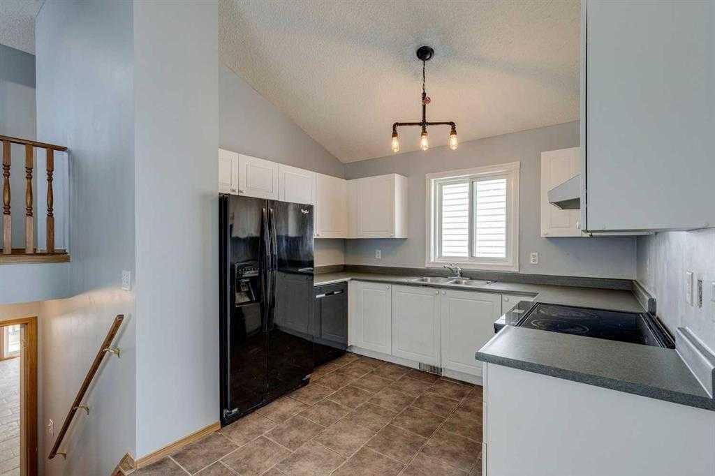 2142 Country Hills Circle Nw, Calgary, AB - Indoor Photo Showing Kitchen With Double Sink