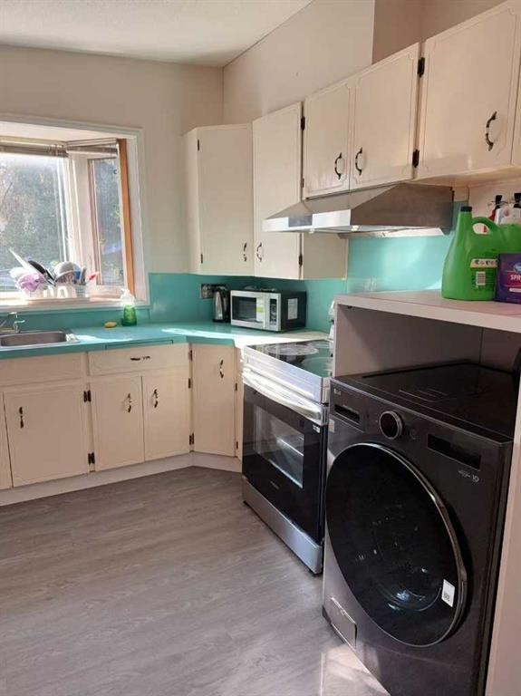 3727 Valdes Place Nw, Calgary, AB - Indoor Photo Showing Laundry Room