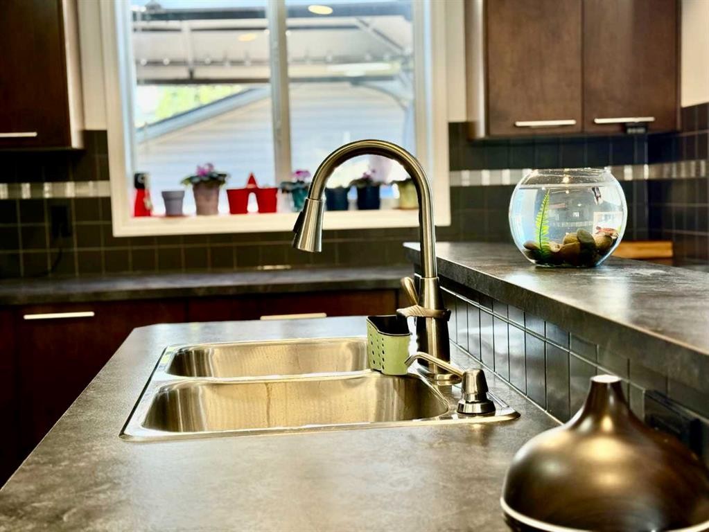 43 Bridlecrest Road Sw, Calgary, AB - Indoor Photo Showing Kitchen With Double Sink