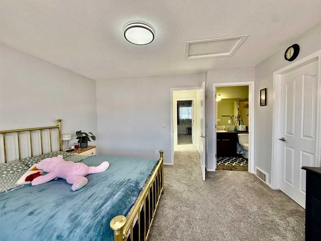 43 Bridlecrest Road Sw, Calgary, AB - Indoor Photo Showing Bedroom