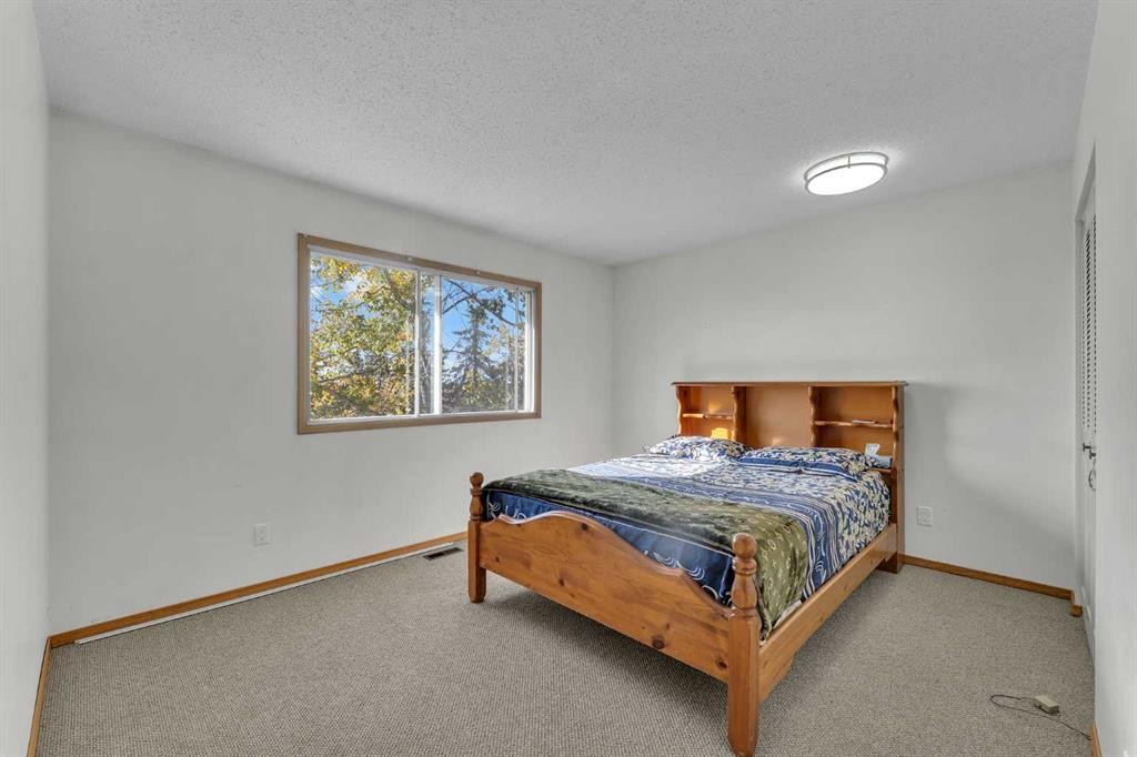 233081 Glenmore View Road, Rural Rocky View County, AB - Indoor Photo Showing Bedroom