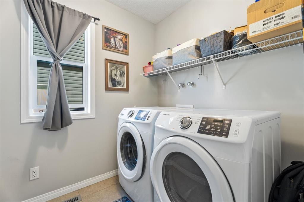 178 Buckskin Way, Cochrane, AB - Indoor Photo Showing Laundry Room