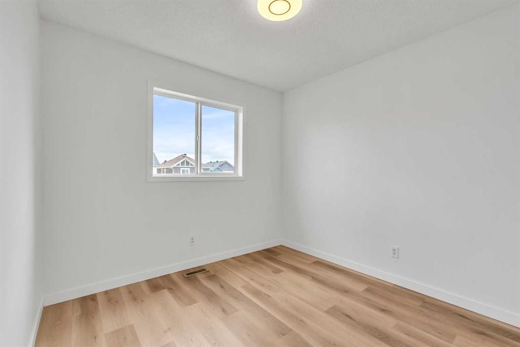 1149 Martindale Boulevard Ne, Calgary, AB - Indoor Photo Showing Other Room
