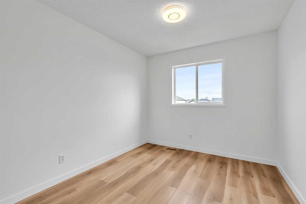 1149 Martindale Boulevard Ne, Calgary, AB - Indoor Photo Showing Other Room