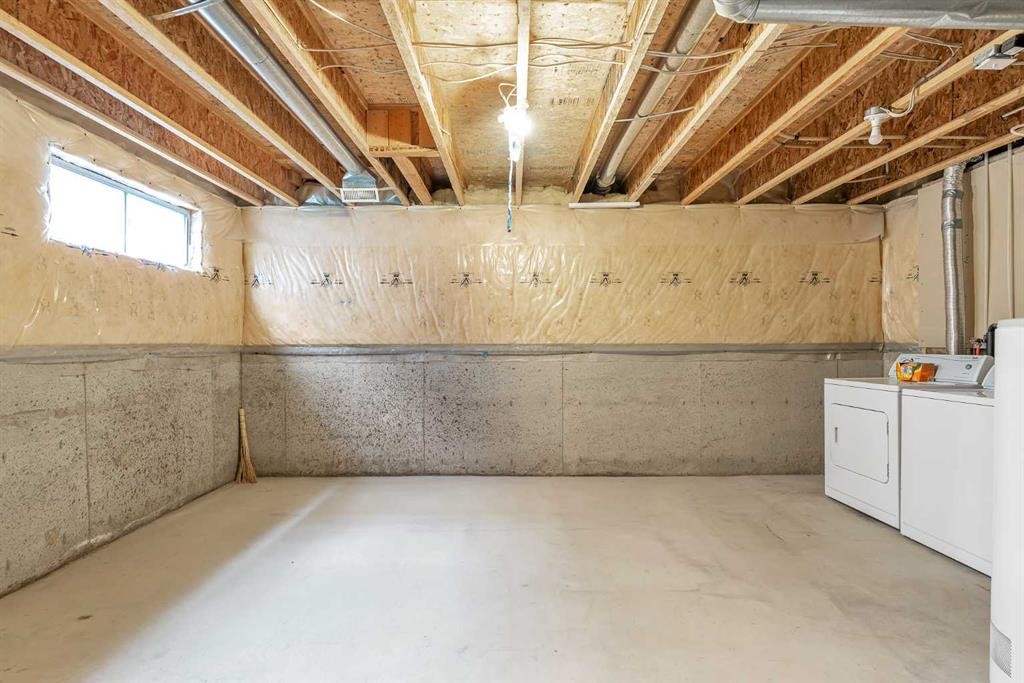 1149 Martindale Boulevard Ne, Calgary, AB - Indoor Photo Showing Laundry Room