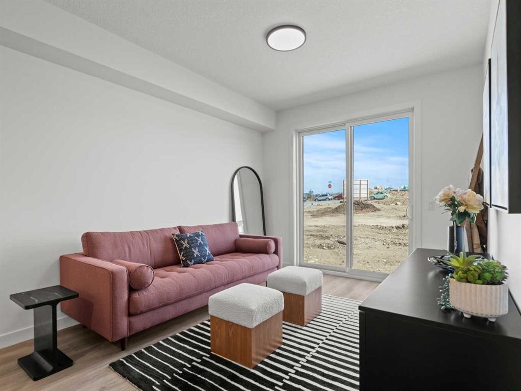 A109-2026 81 Street Sw, Calgary, AB - Indoor Photo Showing Living Room