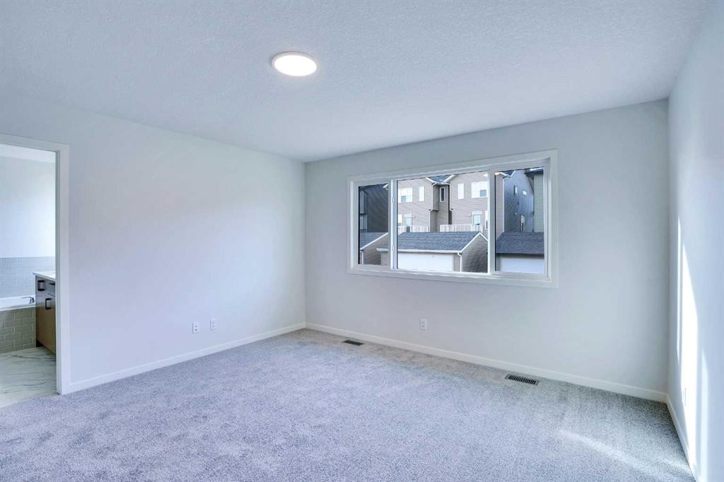 312 Edith Place Nw, Calgary, AB - Indoor Photo Showing Other Room