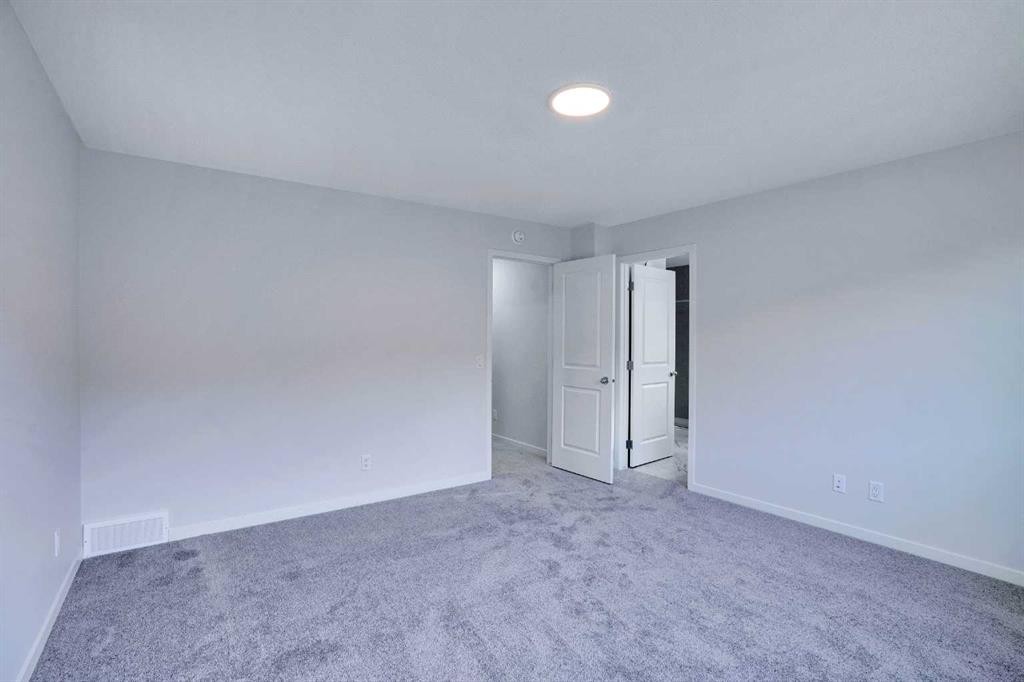 312 Edith Place Nw, Calgary, AB - Indoor Photo Showing Other Room