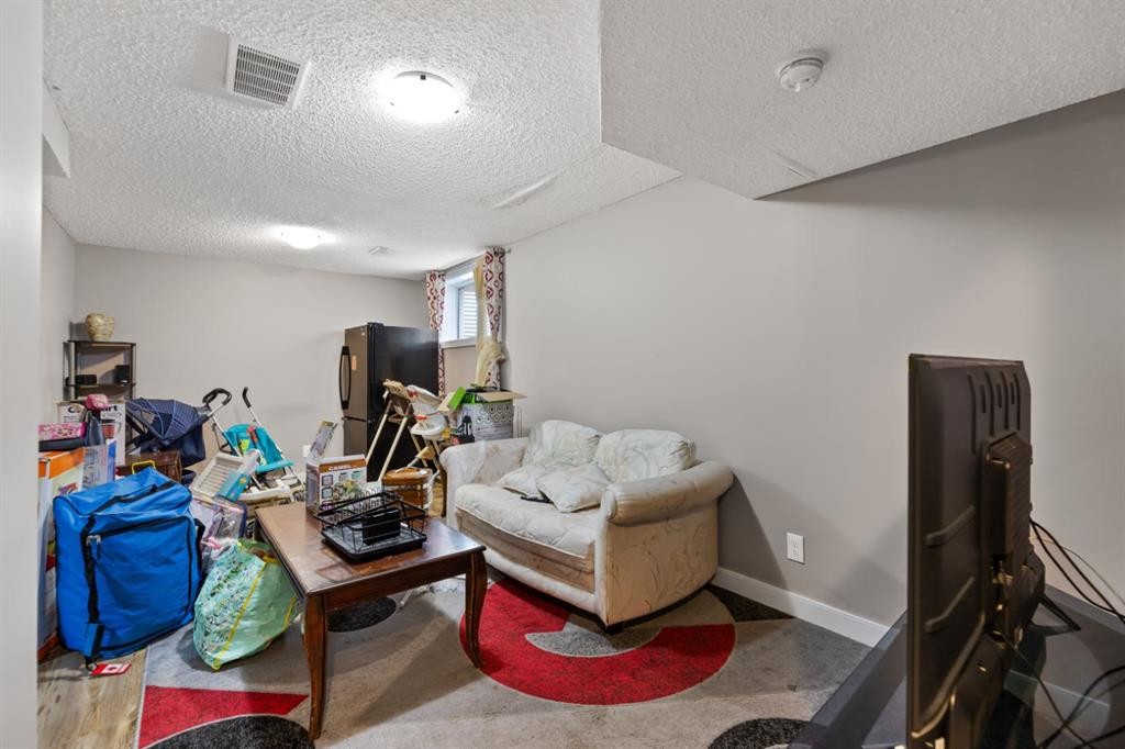 935 Windhaven Close Sw, Airdrie, AB - Indoor Photo Showing Other Room