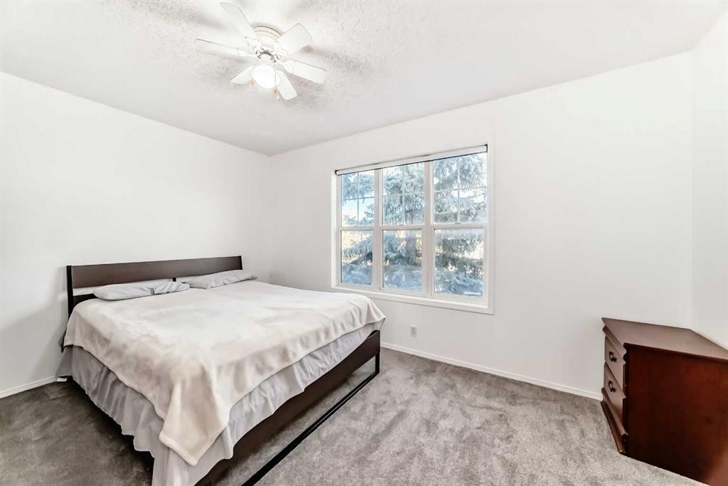 79 Hidden Crescent Nw, Calgary, AB - Indoor Photo Showing Bedroom