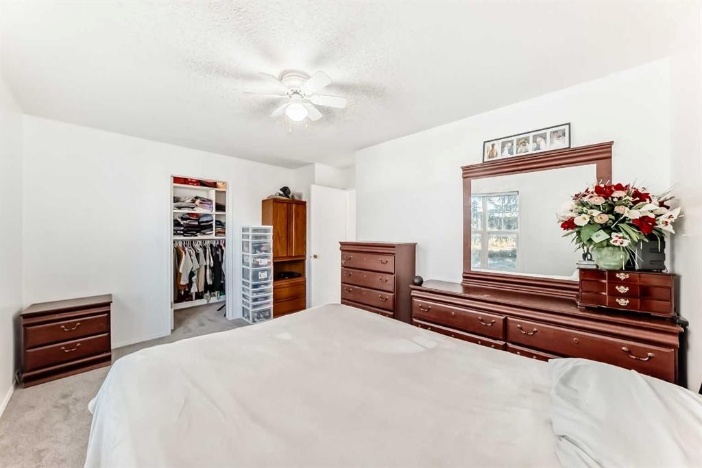 79 Hidden Crescent Nw, Calgary, AB - Indoor Photo Showing Bedroom