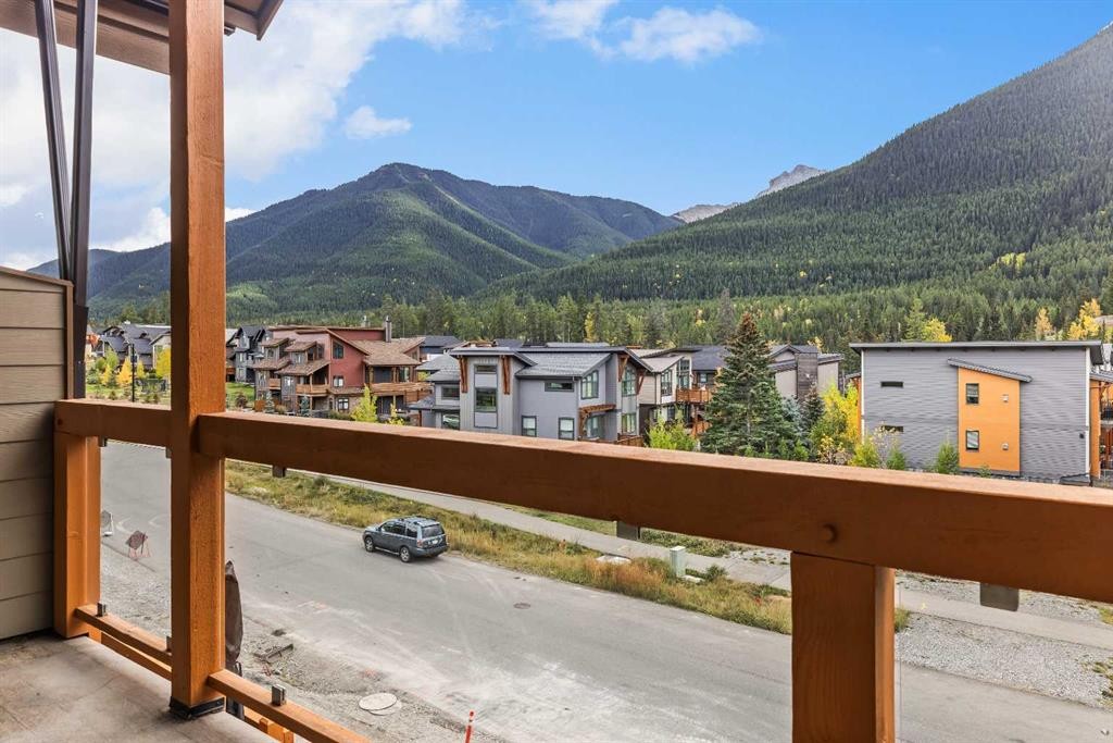 204-105 Stewart Creek Rise Sw, Canmore, AB - Outdoor With Balcony