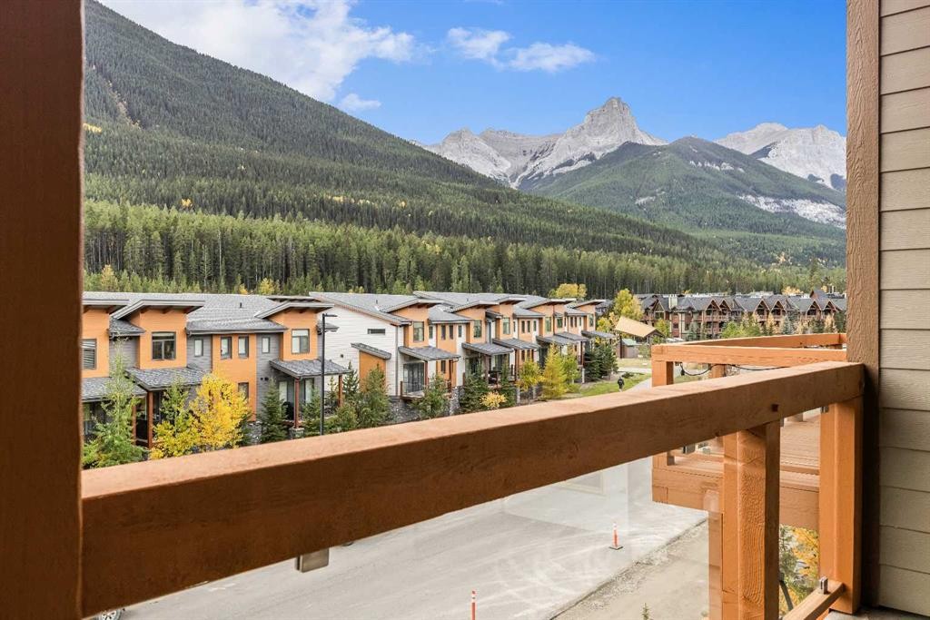 204-105 Stewart Creek Rise Sw, Canmore, AB - Outdoor With Balcony