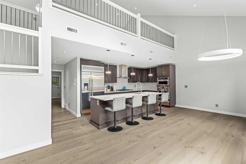 204-105 Stewart Creek Rise Sw, Canmore, AB - Indoor Photo Showing Kitchen