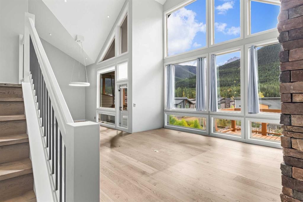 204-105 Stewart Creek Rise Sw, Canmore, AB - Indoor Photo Showing Other Room