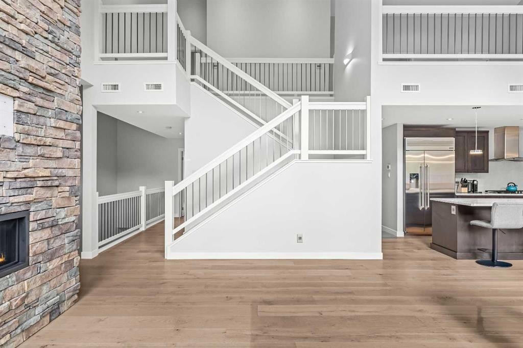 204-105 Stewart Creek Rise Sw, Canmore, AB - Indoor With Fireplace