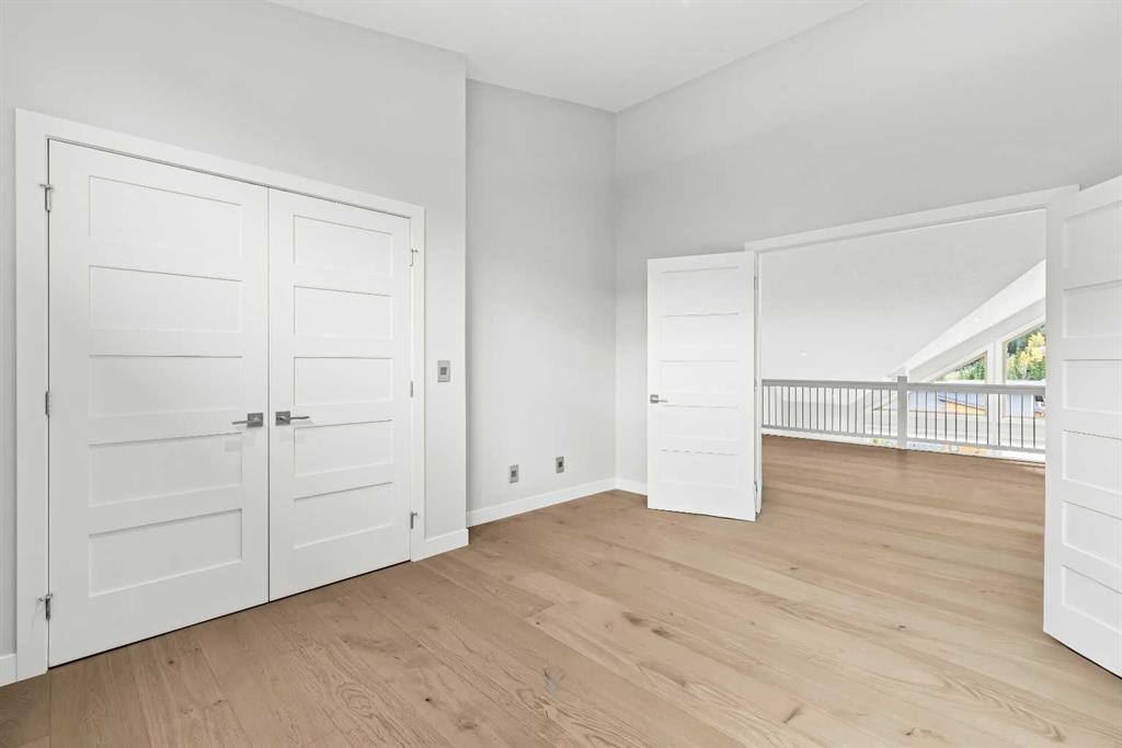 204-105 Stewart Creek Rise Sw, Canmore, AB - Indoor Photo Showing Other Room