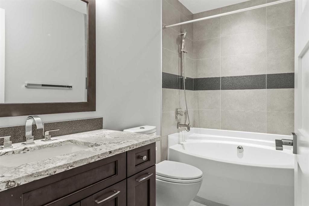 204-105 Stewart Creek Rise Sw, Canmore, AB - Indoor Photo Showing Bathroom