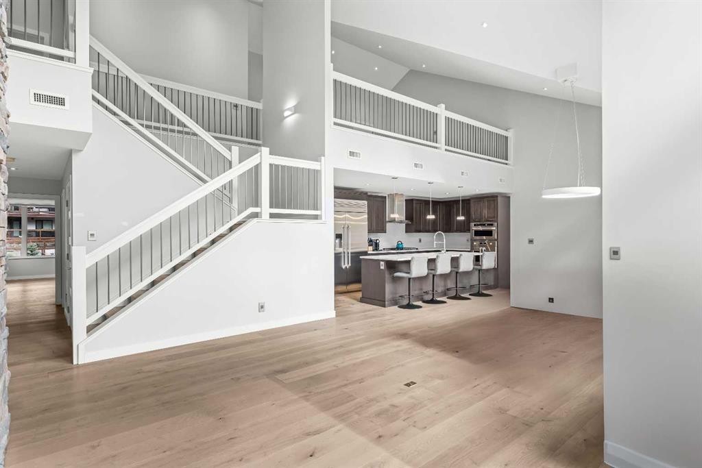 204-105 Stewart Creek Rise Sw, Canmore, AB - Indoor Photo Showing Other Room