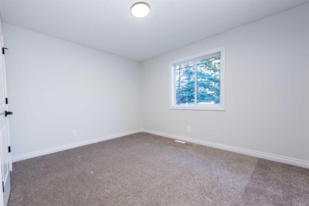 181 Chapala Drive Se, Calgary, AB - Indoor Photo Showing Other Room