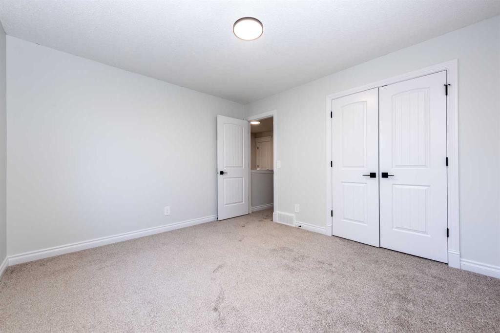 181 Chapala Drive Se, Calgary, AB - Indoor Photo Showing Other Room