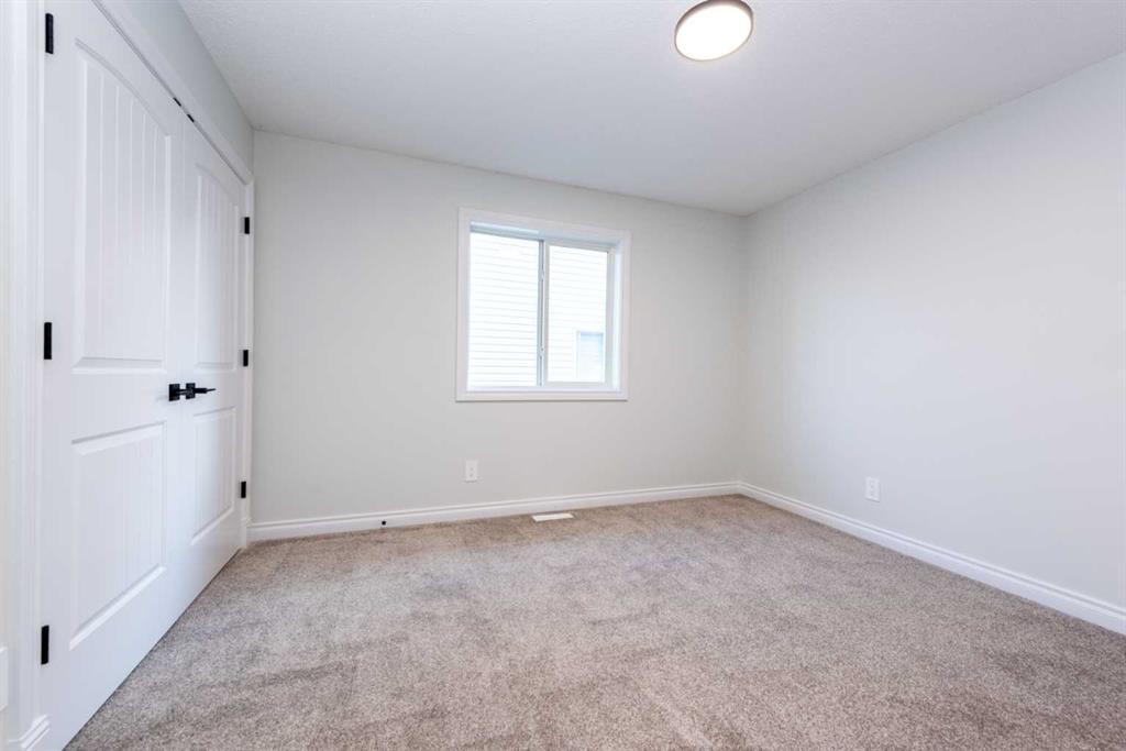 181 Chapala Drive Se, Calgary, AB - Indoor Photo Showing Other Room