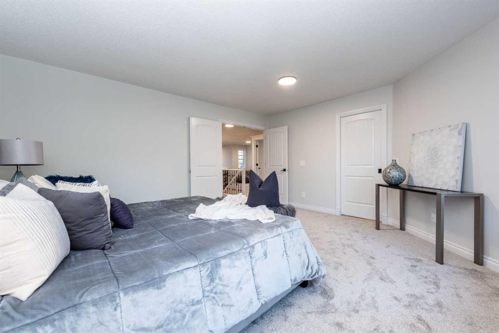 181 Chapala Drive Se, Calgary, AB - Indoor Photo Showing Bedroom