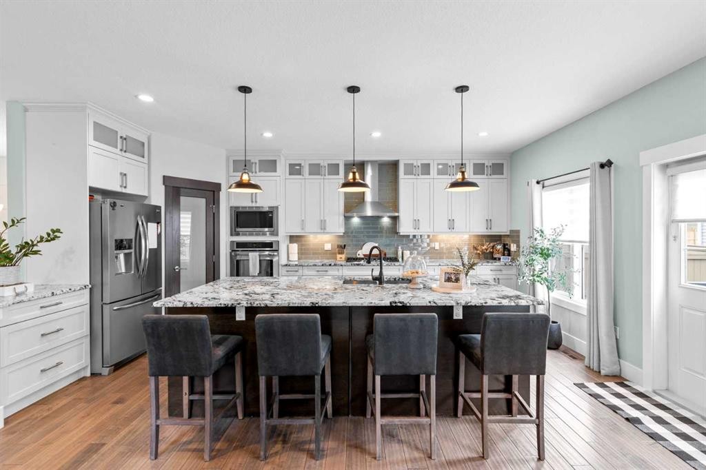 148 Baysprings Court Sw, Airdrie, AB - Indoor Photo Showing Kitchen With Upgraded Kitchen