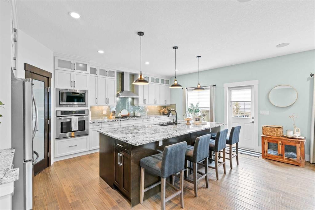 148 Baysprings Court Sw, Airdrie, AB - Indoor Photo Showing Kitchen With Upgraded Kitchen