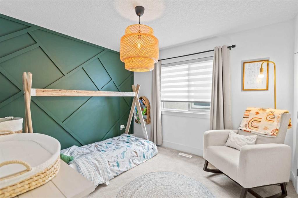 148 Baysprings Court Sw, Airdrie, AB - Indoor Photo Showing Bedroom
