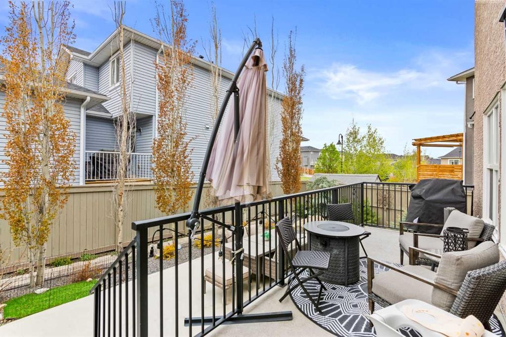 148 Baysprings Court Sw, Airdrie, AB - Outdoor With Deck Patio Veranda With Exterior