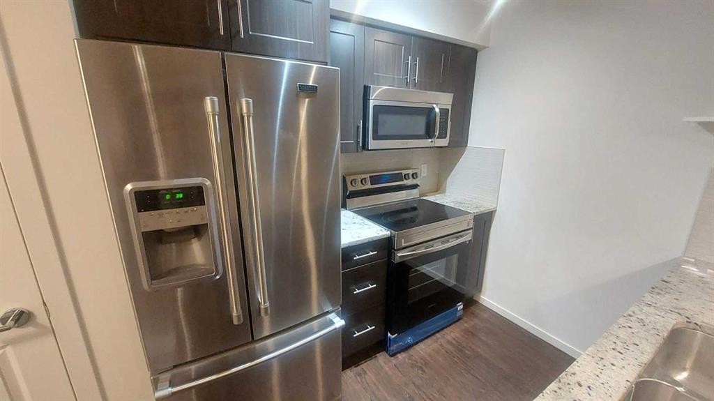 4207-755 Copperpond Boulevard Se, Calgary, AB - Indoor Photo Showing Kitchen