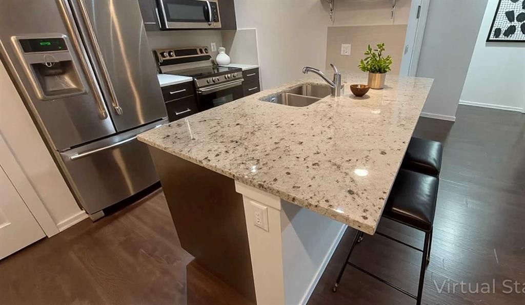 4207-755 Copperpond Boulevard Se, Calgary, AB - Indoor Photo Showing Kitchen With Double Sink With Upgraded Kitchen