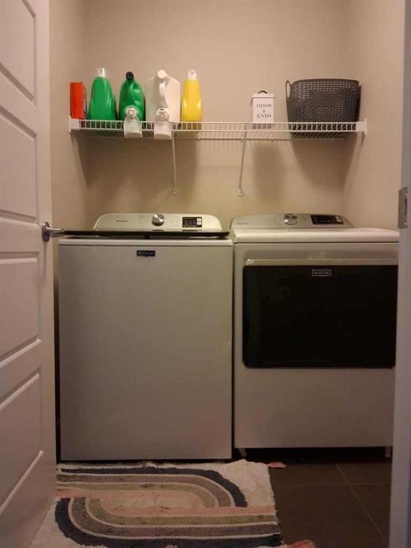 49 Fireside Bend, Cochrane, AB - Indoor Photo Showing Laundry Room