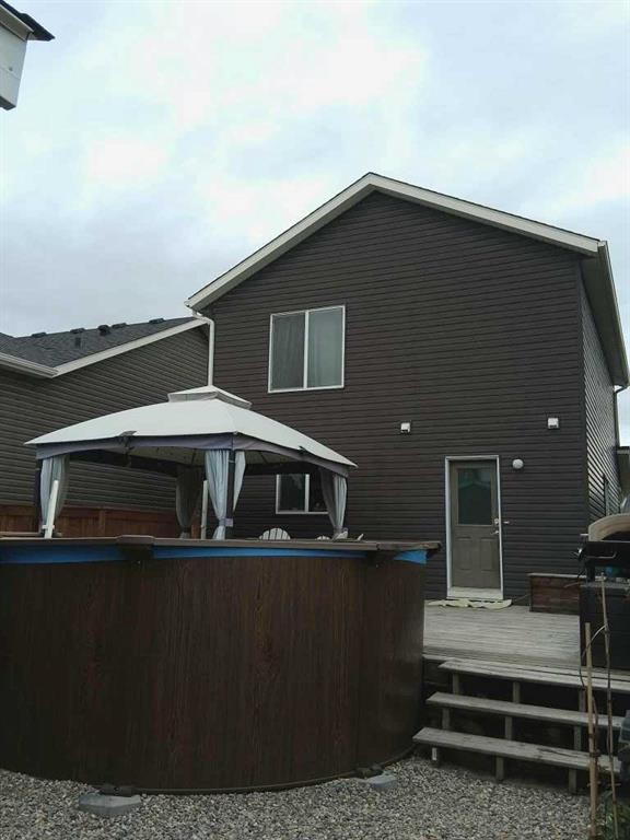 49 Fireside Bend, Cochrane, AB - Outdoor With Exterior