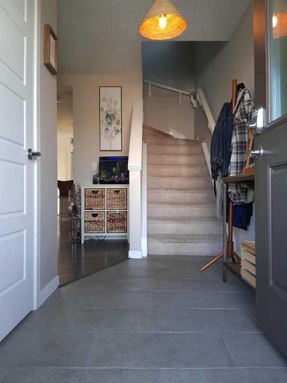 49 Fireside Bend, Cochrane, AB - Indoor Photo Showing Other Room