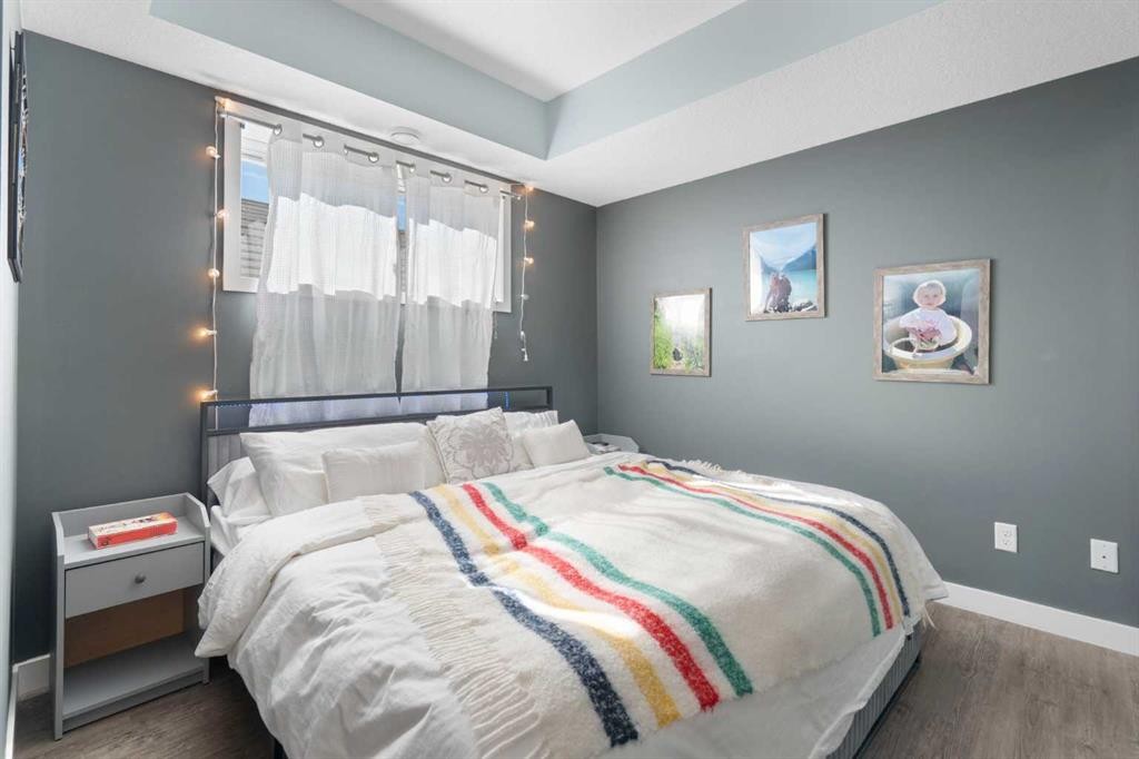 1104-2461 Baysprings Link Sw, Airdrie, AB - Indoor Photo Showing Bedroom